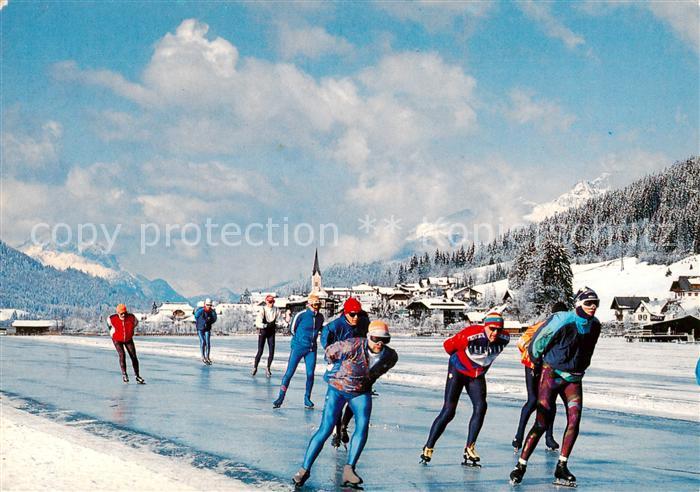 Weissensee Kaernten AT Panorama Schlittschuhlaeufer
