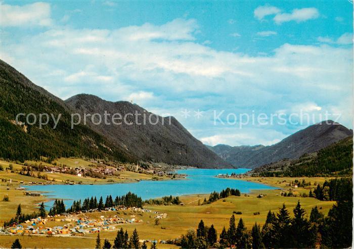 Weissensee Kaernten AT Panorama mit Campingplatz West