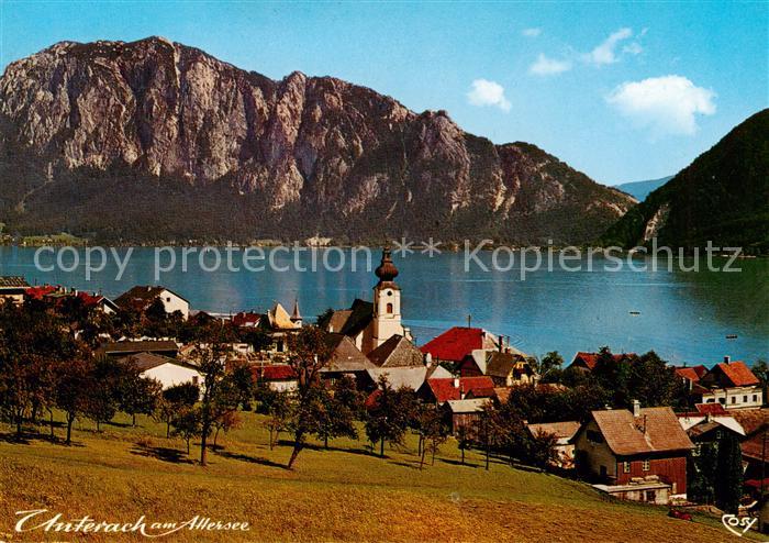 Unterach Attersee AT Ansicht mit Kirche im Hintergrund Hoellengebirge