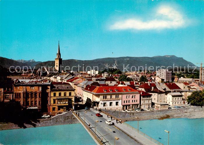 Villach Kaernten AT Ansicht mit Kirche Drau Bruecke Blick gegen Dobratsch