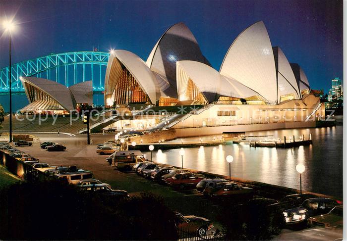 Sydney  NSW Australia The white sails on the Opera House floodlit at dusk