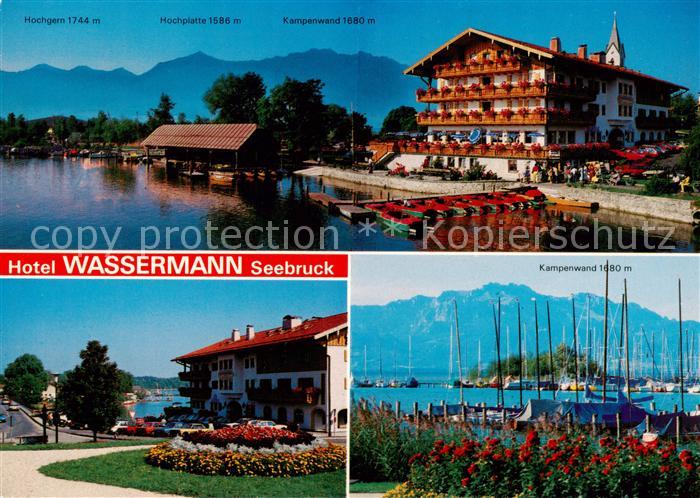 Seebruck Chiemsee Hotel Wassermann mit Hochgern Hochplatte Kampenwand Bootshafen