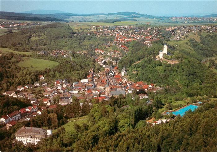 Stromberg Hunsrueck Fliegeraufnahme mit der Stromburg und Hoehenfreibad
