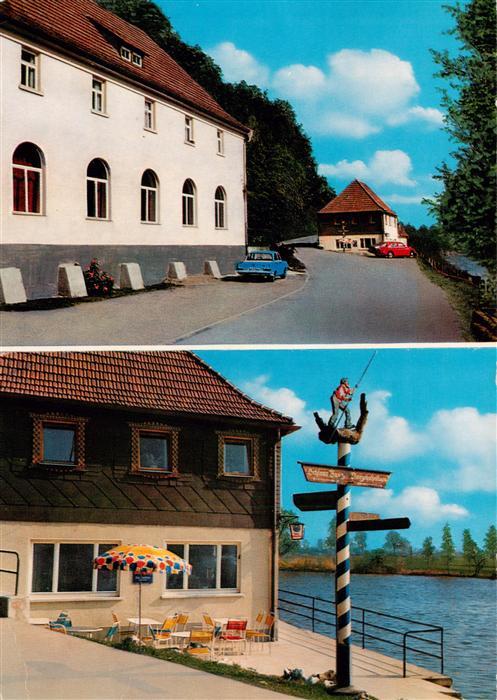 Hausen Main Gasthof Mainfaehre mit Gaestehaus und Wegweiser