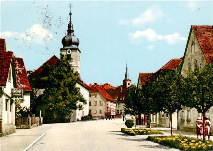 Schillingsfuerst Ortspartie mit Kirche