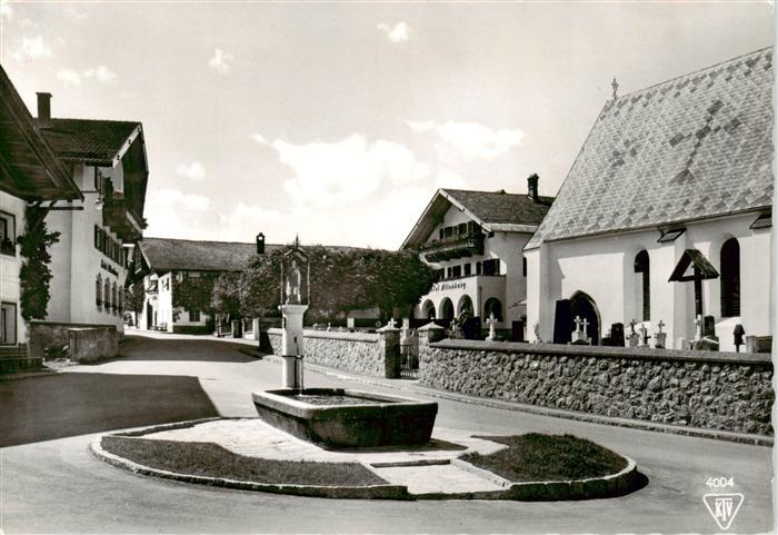 Mutters Tirol AT Dorfbrunnen mit Hotel Altenburg