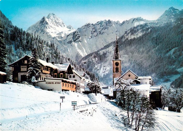 Gaschurn Vorarlberg Ortsansicht mit Kirche Winter in den Alpen