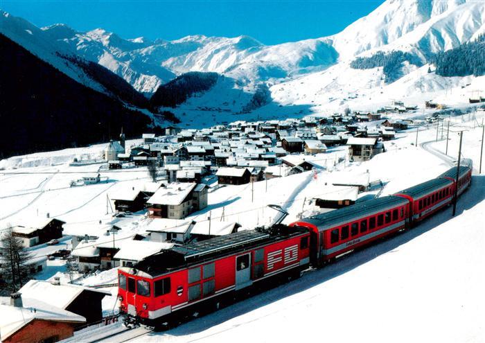 Sedrun mit Rueras und Skigebiet von Milez Piz Badus mit Eisenbahn