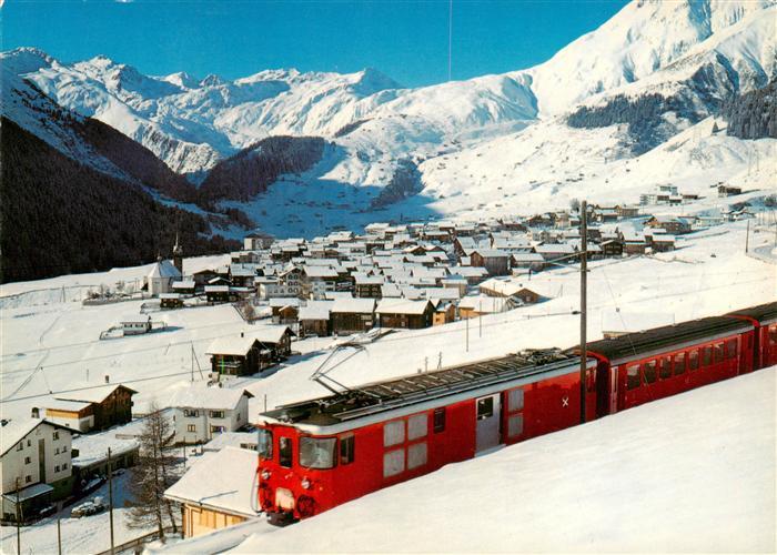 Sedrun Rueras und Skigebiet von Milez mit Eisenbahn