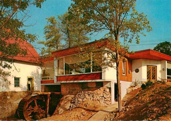 Bad Iburg Cafe Schlossmuehle Haupteingang mit Muehlrad