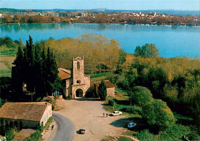 Porqueres Vista-aérea Iglesia-Románica Romanische-Kirche See Baeume Dorf