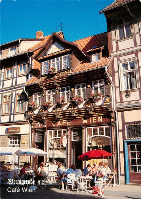 Wernigerode Harz Café-Wien Fachwerk Fassade Blumendekor Aussengastronomie Sonnen