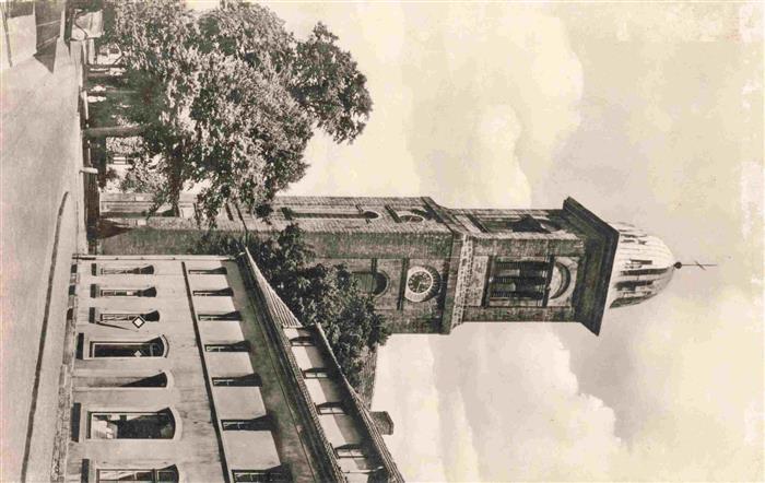 Ibbenbueren NRW Katholische-Kirche Kirchturm Kirchenuhr Strasse Geschaeft Baeume