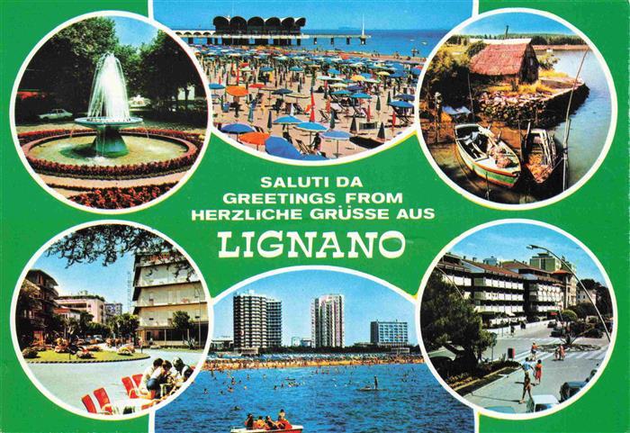 LIGNANO  Sabbiadoro Veneto IT Strand Brunnen Hochhaeuser Meer Boote Fischerhuett